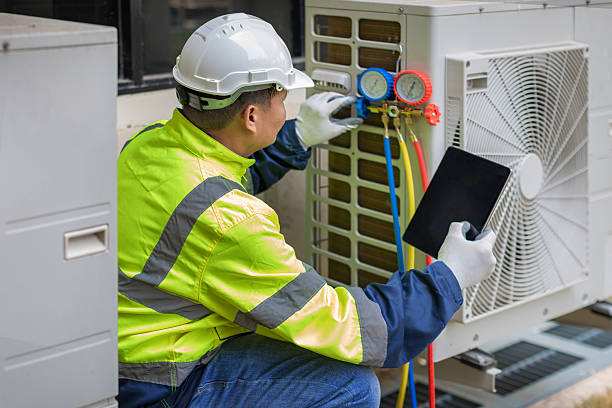Professional Hvac technician working in West Des Moines, IA
